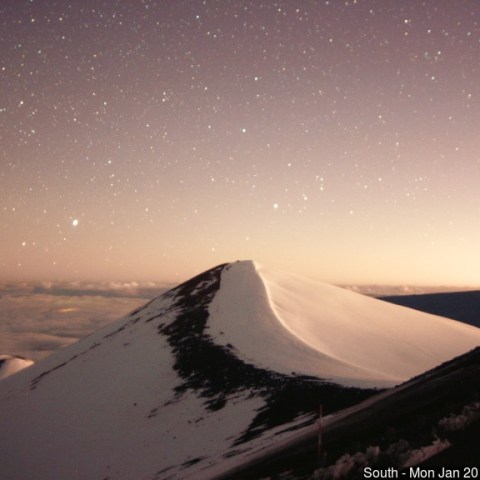 a close up of a snow covered mountain