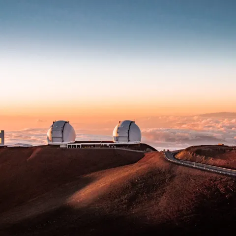 a sunset over Mauna Kea