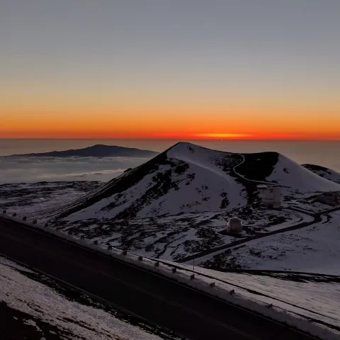 a sunset over a body of water