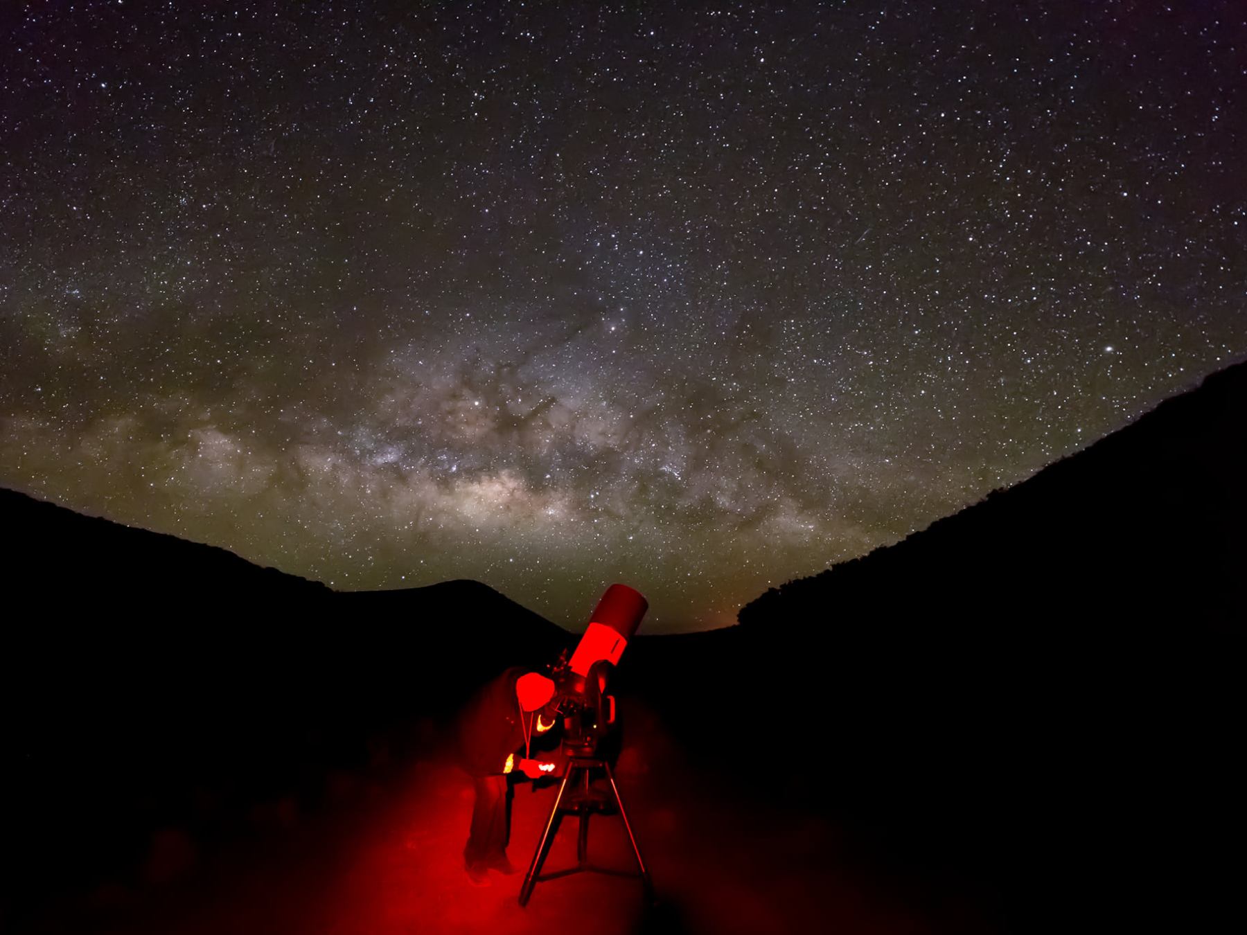 a person in a dark sky