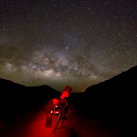 a person in a dark sky