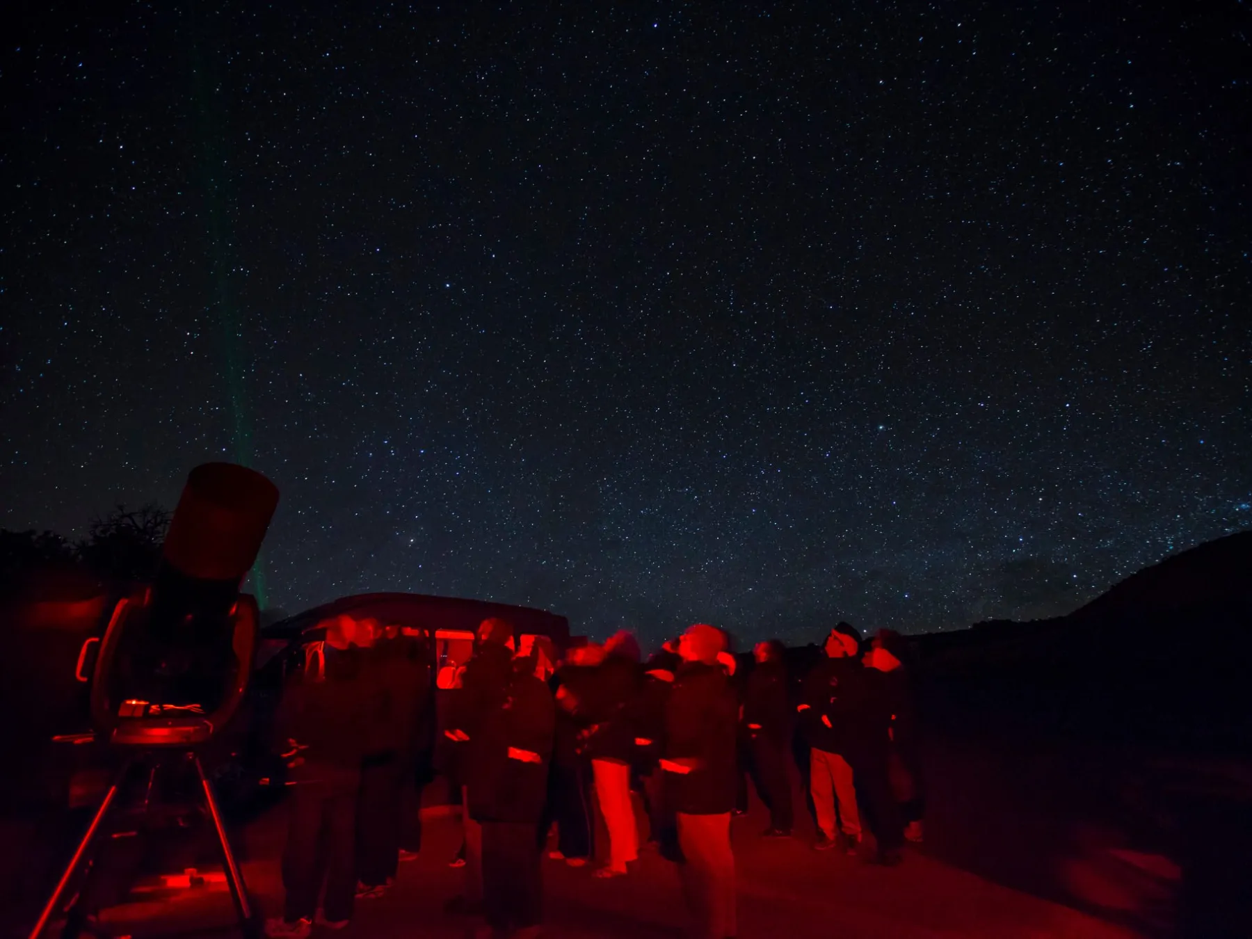 a group of people in a dark room
